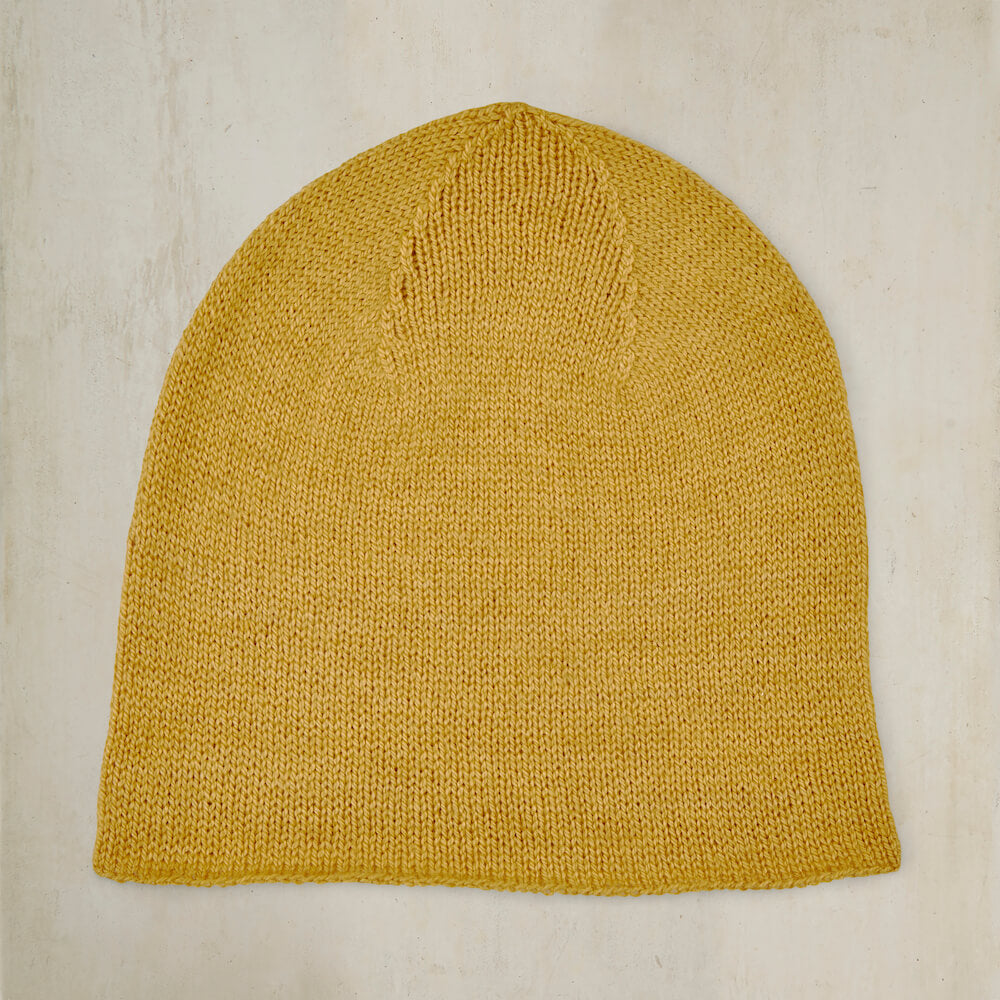 Muskox Knitted Beanie Hat In Gold